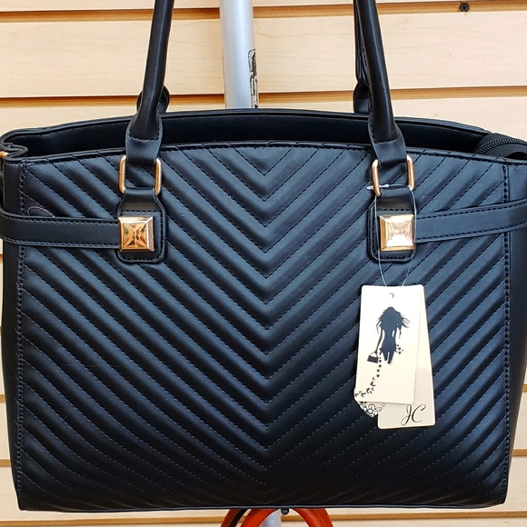 None Handbags - Black quilted purse with chevron design